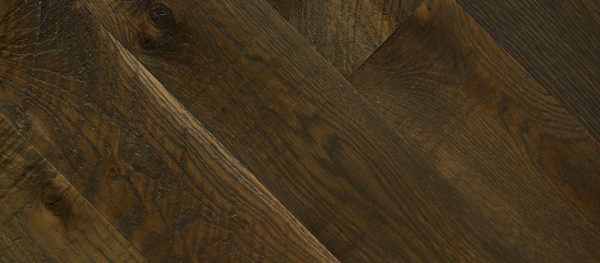 The Summer Cabin flooring features a diagonal plank pattern in dark wood, evoking the warmth and invitation of a summer cabin. Its richly textured wood grain highlights natural elegance.