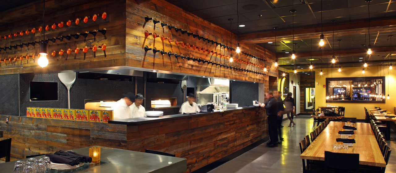 Reclaimed barn wood wall paneling in a restaurant.