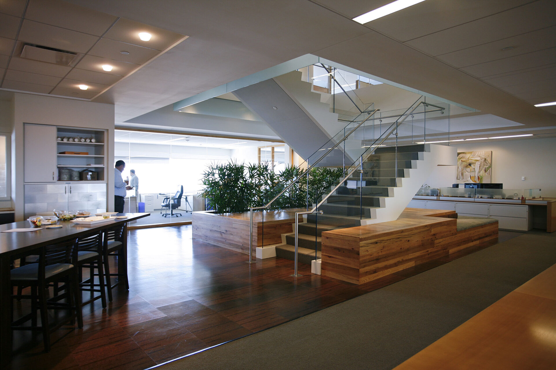 Office with reclaimed oak flooring and paneling.