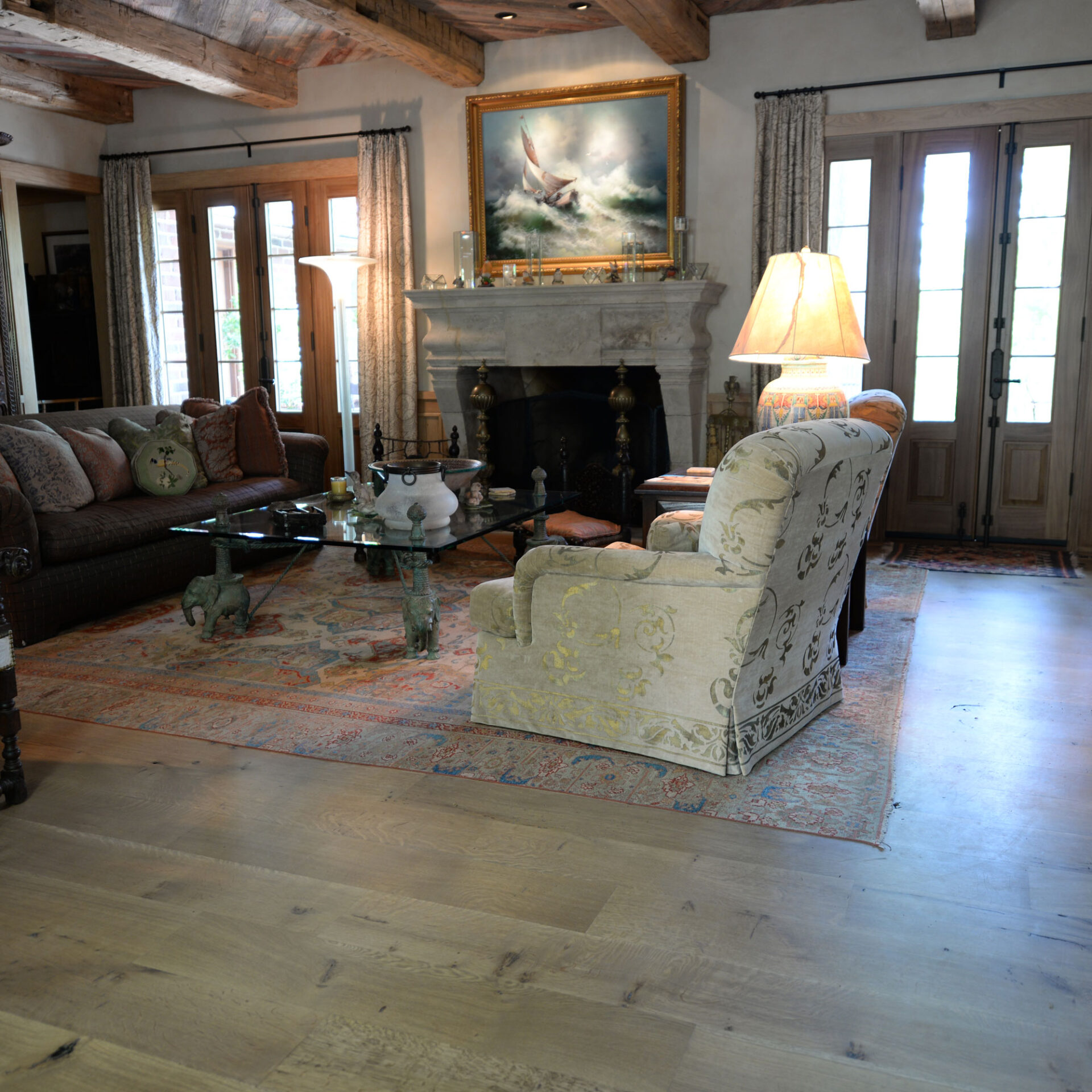 A decorated living room featuring white oak wooden flooring