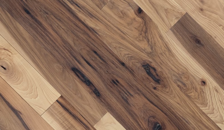 Close-up of Import placeholder for 25335 floorboards, featuring rich brown shades and bold grain patterns.